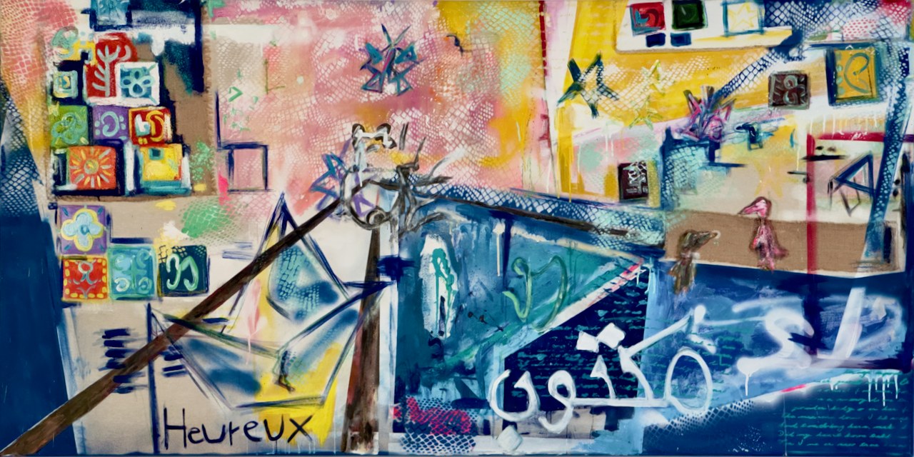 Envers l’humanité by Michèle Reby — mixed media on canvas: a paper boat sails through a vivid cityscape of painted tiles, ornaments and script; the word Heureux is written along the lower edge, Arabic script flows across a deep blue wall.